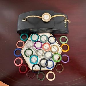 Authentic Ladies Gucci Watch with 28 interchangeable colored bezels
